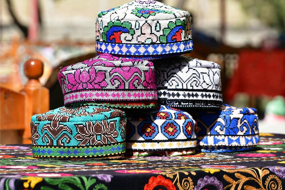 a group of colorful hats sitting on top of a table