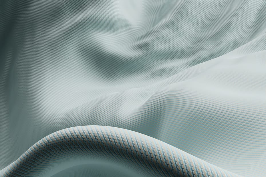 a close up of a white fabric with wavy lines